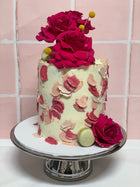 Extended 6” with added fresh flowers and macrons